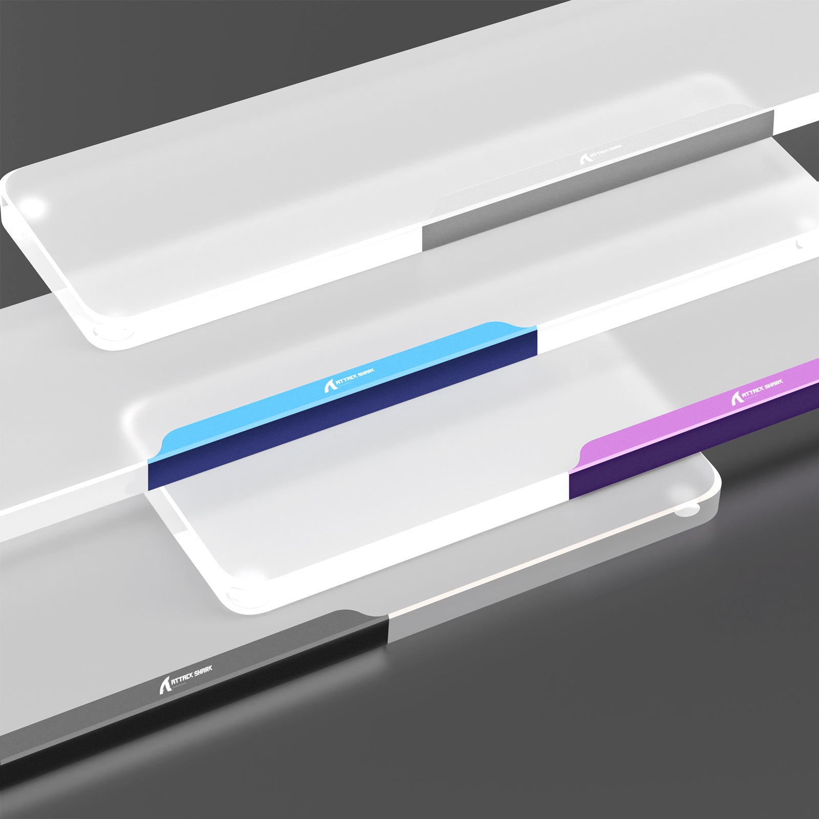 Translucent acrylic wrist rests in gray, blue, and purple for ergonomic support.